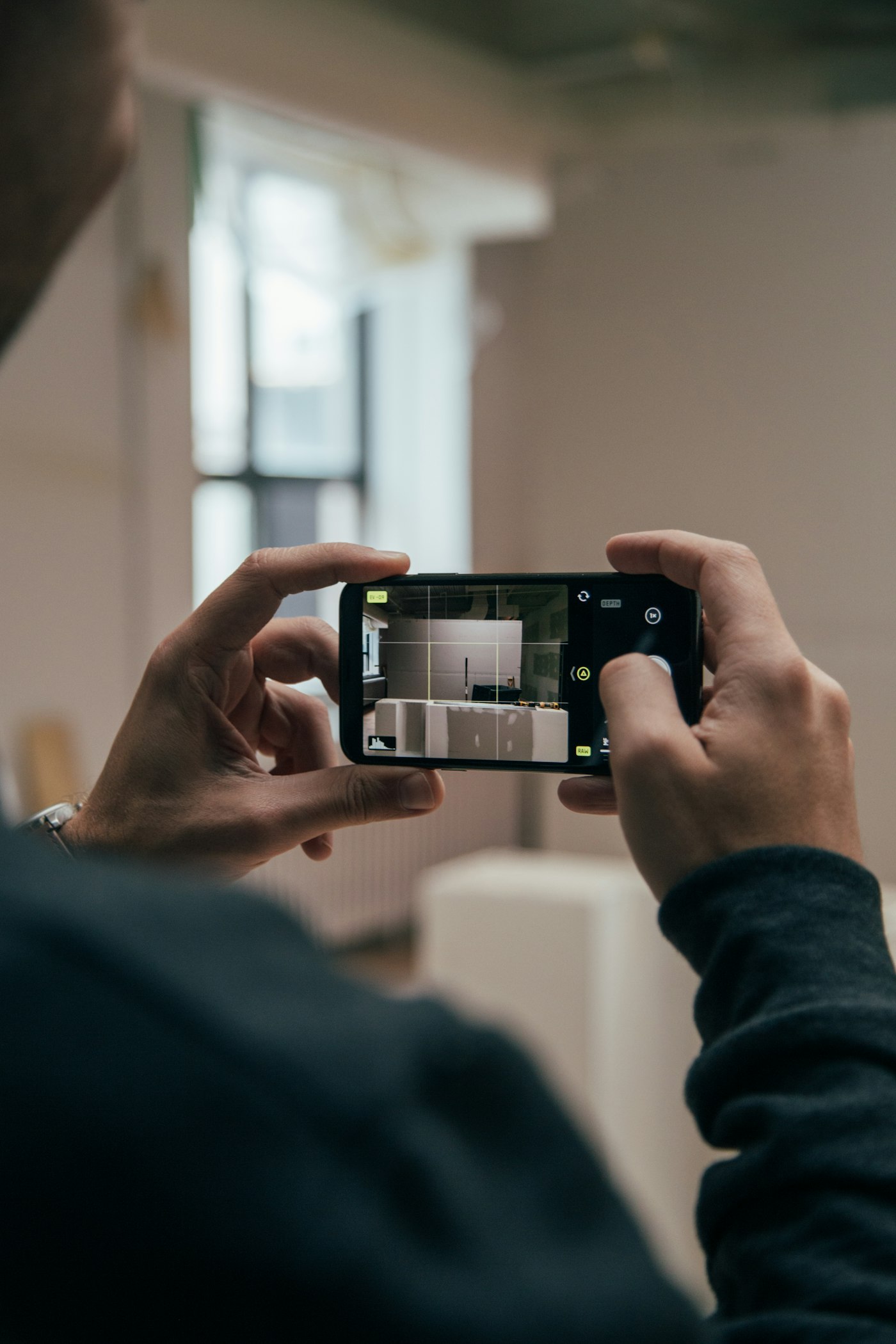 Creator filming content on a smartphone